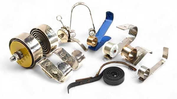 Constant force springs for carbon brush holders